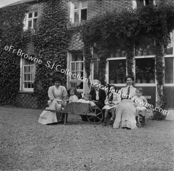 TRACTON HOUSE GROUP WITH WHEELBARROW